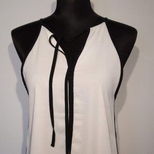 White Polyester Flowing shoulder strap camisole with Black trim